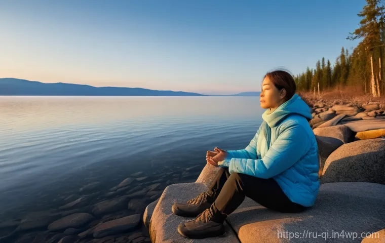 명상적 여행과 아트 테라피의 연결 - **Meditative Serenity by Lake Baikal:**
"A woman, fully clothed in warm, comfortable outdoor att...